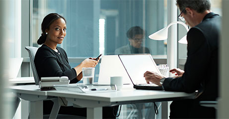 Businesswoman in a conference room looking at the camera