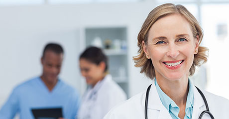 Healthcare professional smiling at the camera