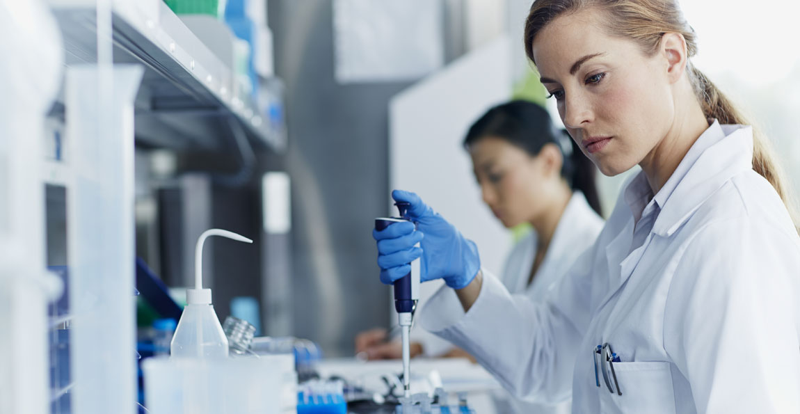 Two female laboratory technicians at work