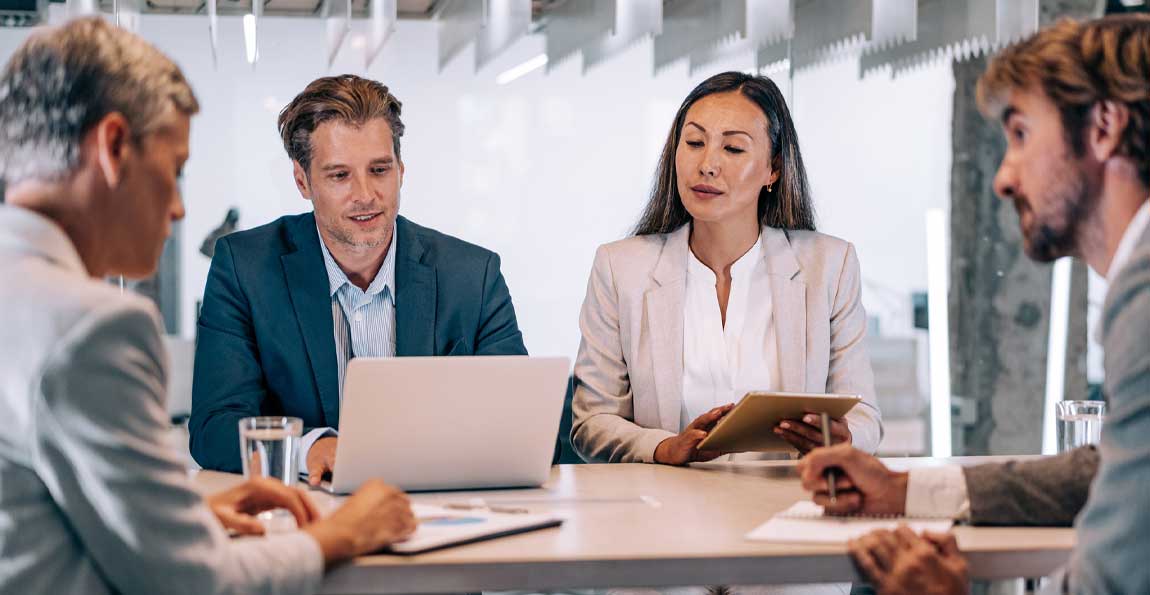 Investment partners comparing financing options