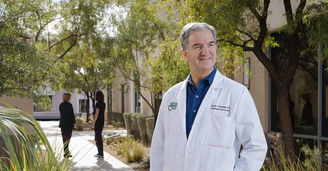 Dr. Andrew J. Bronstein smiling for the camera