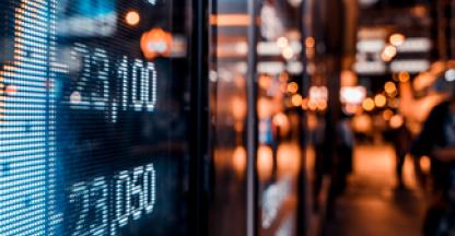 Abstract graphic showing stock ticker reflected in a window