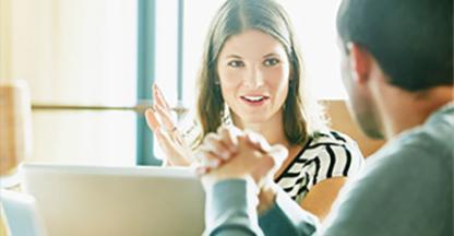 Woman explaining something to colleague