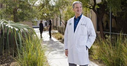 Dr. Andrew J. Bronstein smiling for the camera