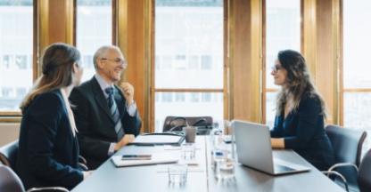 Lawyers meeting with a client