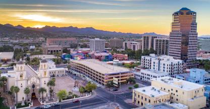 A small desert city at sunset