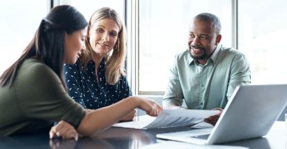 Small business owners choosing a business bank.