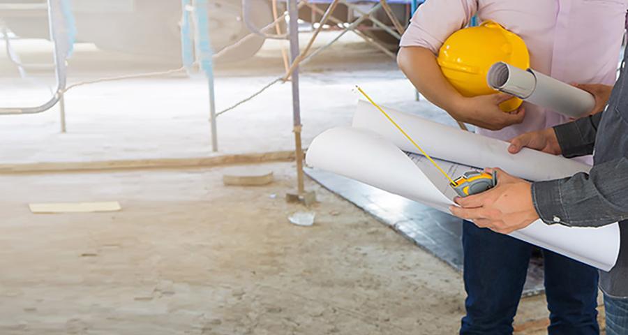 Neckdown view of two people on a construction site