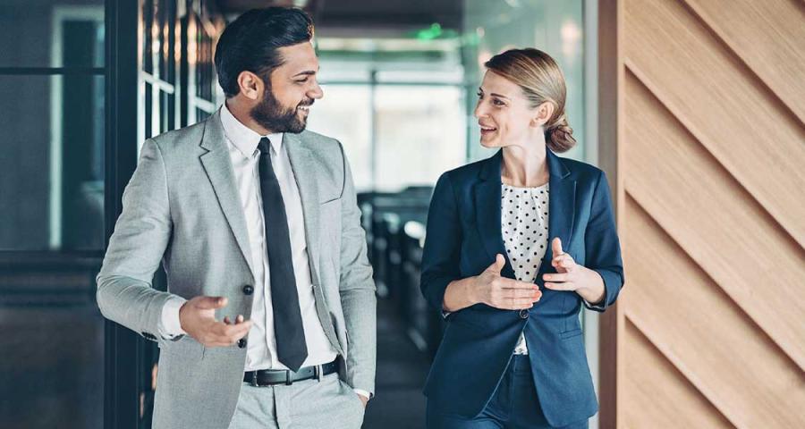 A business banking professional speaking with a client