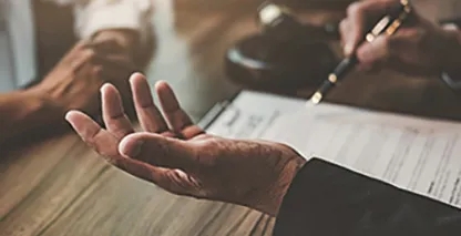 Picture of hands over a document