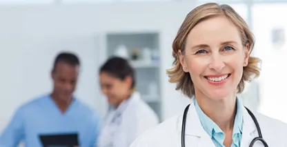 Healthcare professional smiling at the camera
