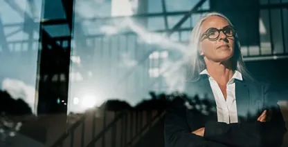 Businesswoman looking out a window