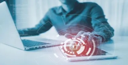 Photo illustration of a lock over a person using a computer