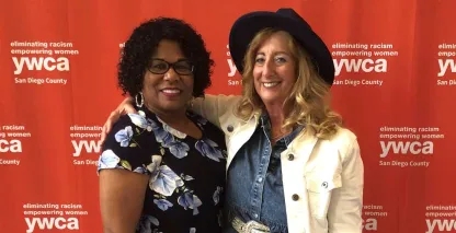 Two Torrey Pines Bank employees receiving a YWCA Award