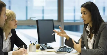 A business banker meeting with new clients