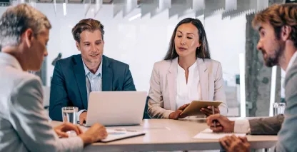 Investment partners comparing financing options