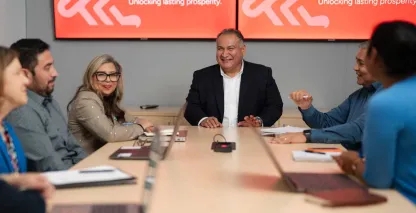 A business team sitting at a table during a meeting