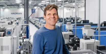 Man in a blue sweater at Hadrian facility