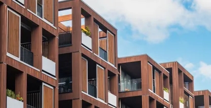 Modern wood-paneled condominium buildings
