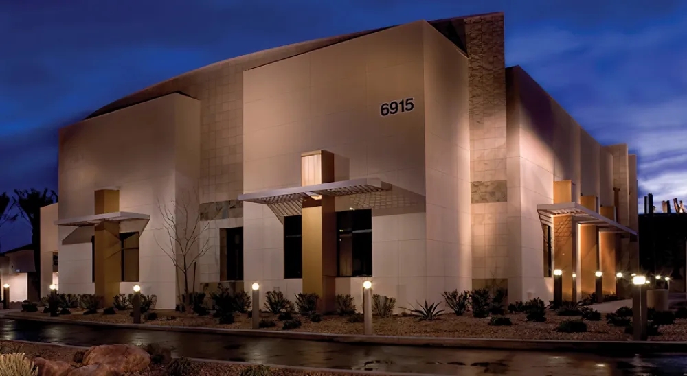 Front entrance of the Aliante branch at night.