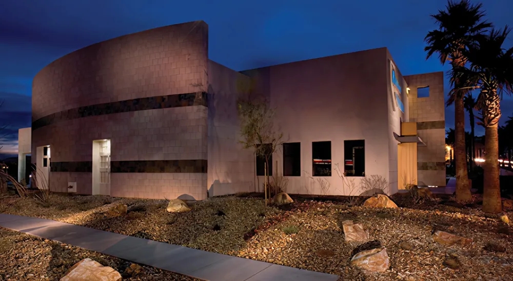 View of the Centennial branch from the parking lot at night.