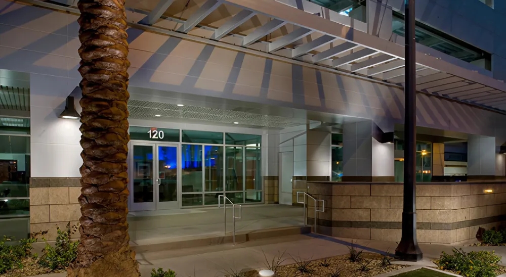 View of the Grand Central Parkway branch from the parking lot at night