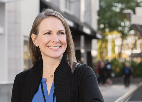 Woman smiling and looking into the distance