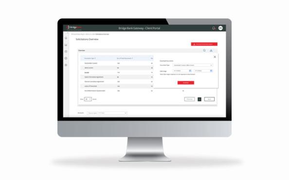 A desktop monitor showing the Bridge Bank user interface