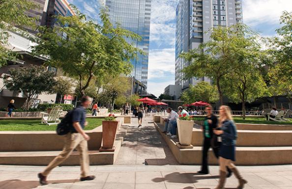 People walking around the central plaza at Phoenix CityScape