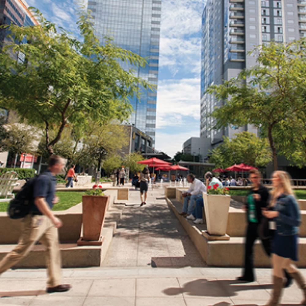 People walking around the central plaza at Phoenix CityScape